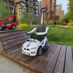 2025 New Design Ride-On Car with Push Handle for Kids – Fun, Safe, and Engaging Ride-On Toy - Image 4